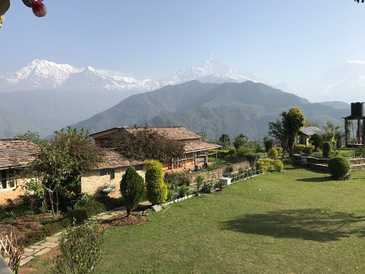 First glimpse of the Eco-Village with mountains behind